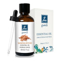 Sandalwood essential oil in a 30 ml amber glass dropper bottle, shown beside its box
